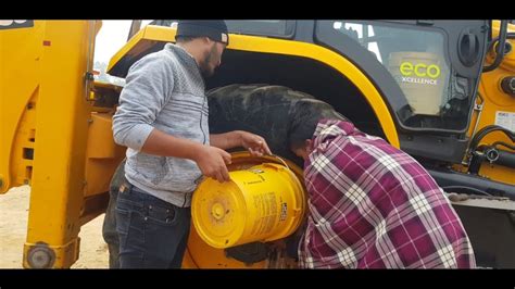 jcb skid steer oil change|how to change jcb oil.